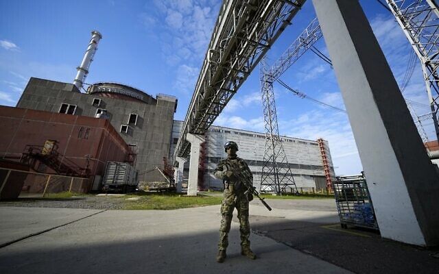 Illustrative: A Russian serviceman guards in an area of the Zaporizhzhia Nuclear Power Station in territory under Russian military control, southeastern Ukraine, Sunday, May 1, 2022. (AP Photo, File)