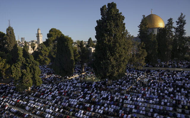 Muslim worshipers offer Eid al-Adha prayers in Jerusalem's Old City, July 9, 2022. (AP Photo/Mahmoud Illean)