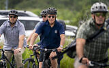 US President Joe Biden on a bike ride in Gordons Pond State Park in Rehoboth Beach, Delaware, July 10, 2022. (AP Photo/ Andrew Harnik)