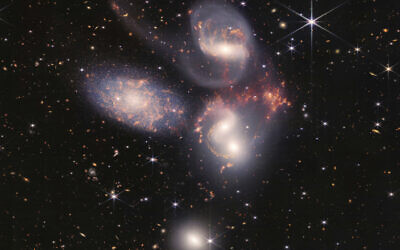 Illustrative: This image provided by NASA on Tuesday, July 12, 2022, shows Stephan's Quintet, a visual grouping of five galaxies captured by the Webb Telescope's Near-Infrared Camera (NIRCam) and Mid-Infrared Instrument (MIRI). This mosaic was constructed from almost 1,000 separate image files, according to NASA. (NASA, ESA, CSA, and STScI via AP)