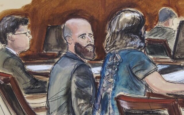 In this courtroom sketch, Joshua Schulte, center, is seated at the defense table flanked by his attorneys during jury deliberations, Wednesday March 4, 2020, in New York. Schulte, the former CIA software engineer accused of causing the biggest theft of classified information in CIA history, has been convicted at a New York City retrial. A jury reached the guilty verdict against Joshua Schulte on Wednesday, July 13, 2022 in federal court in Manhattan. (Elizabeth Williams via AP)