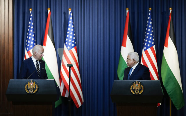 US President Joe Biden listens as Palestinian Authority President Mahmoud Abbas speaks during a joint statement at the West Bank town of Bethlehem, July 15, 2022. (AP Photo/Majdi Mohammed)