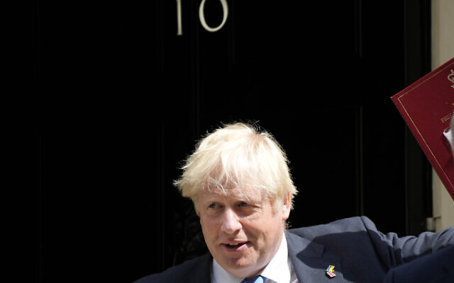 Britain's Prime Minister Boris Johnson leaves 10 Downing Street to attend the weekly Prime Ministers' Questions session in parliament in London, July 20, 2022. (Frank Augstein/AP)