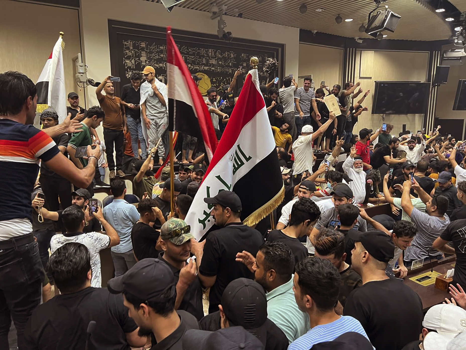 Protesters break into Iraqi parliament, chant curses against Iran | The  Times of Israel