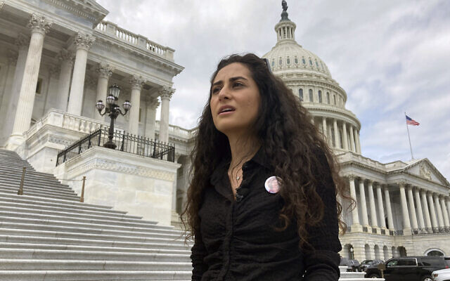 Lina Abu Akleh, the niece of slain Al Jazeera journalist Shireen Abu Akleh, speaks to the Associated Press at the US Capitol during a trip to Washington, Wednesday, July 27, 2022. Family members are in the nation's capital asking the Biden administration for an investigation into Shireen's death. (AP/Nathan Ellgren)
