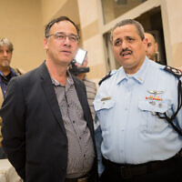 Outgoing Israel Police chief Roni Alsheich (right) with State Prosecutor Shai Nitzan during a farewell ceremony in his honor in Beit Shemesh on November 29, 2018. (Yonatan Sindel/Flash90)