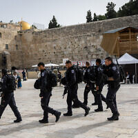 Police patrol at the Western Wall, during the Jewish holiday of Passover, April 17, 2022. (Yonatan Sindel/Flash90)