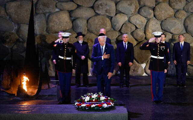 US President Joe Biden lays a wreath at the Yad Vashem Holocaust memorial in Jerusalem, July 13, 2022. (Olivier Fitoussi/Flash90)