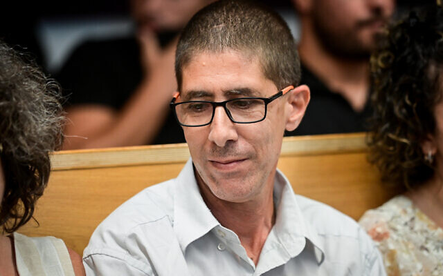 Rami Yogev, who worked in the security system at El Al and was convicted for his part in a drug smuggling ring, arrives for his sentence at the District Court in Tel Aviv, July 19, 2022. (Avshalom Sassoni/Flash90)