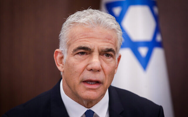 Prime Minister Yair Lapid leads a cabinet meeting at the Prime Minister's office in Jerusalem on July 24, 2022. (Marc Israel Sellem)