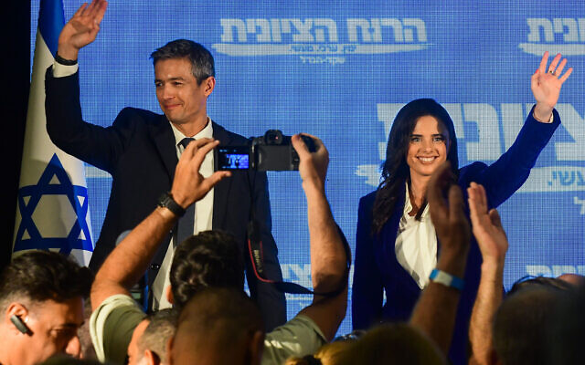 Interior Minister and head of the Yamina party Ayelet Shaked, right, holds a press conference with Communications Minister Yoaz Hendel of Derech Eretz at Hamacabia Village in Ramat Gan, on July 27, 2022. (Avshalom Sassoni/Flash90)