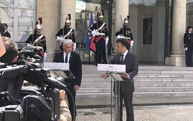 Prime Minister Yair Lapid (L) and French President Emmanuel Macron hold a press conference at the Elysee Palace in Paris, France, July 5, 2022. (Lazar Berman/Times of Israel)