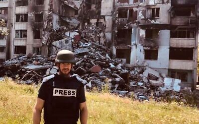 Times of Israel diplomatic correspondent Lazar Berman, on location in Kharkiv, Ukraine, in the wake of an attack by Russian artillery, on July 27, 2022. (Lazar Berman)