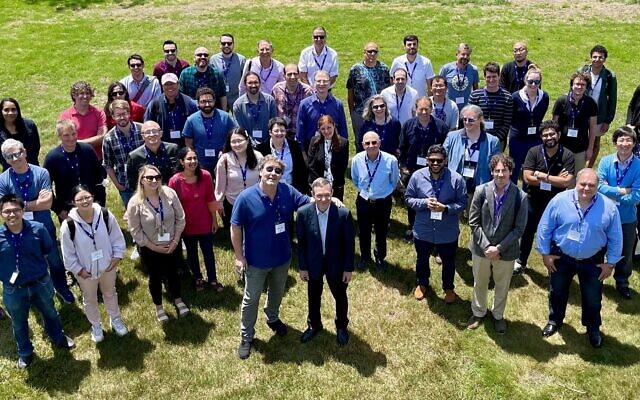 Prof. Avi Loeb, front center, with guests at a conference held in honor of his 60th birthday, Martha's Vineyard, Massachusetts, June 2022. (Courtesy)