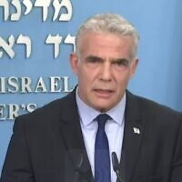 Prime Minister Yair Lapid gives a first televised address to the nation, July 2, 2022. (Channel 12 screenshot)