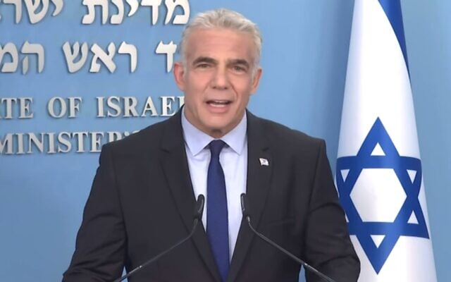 Prime Minister Yair Lapid gives a first televised address to the nation, July 2, 2022. (Channel 12 screenshot)