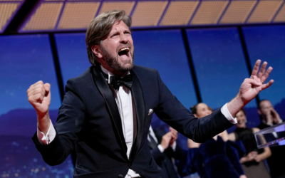 Writer/director Ruben Ostlund celebrates after winning the Palme d'Or for 'Triangle of Sadness' during the awards ceremony of the 75th international film festival, Cannes, southern France, Saturday, May 28, 2022. (Photo by Joel C Ryan/Invision/AP)