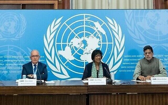File: Navi Pillay (center), chair of the United Nations Independent International Commission of Inquiry on the Occupied Palestinian Territory, including East Jerusalem, and Israel, briefs reporters on the first report of the Commission, June 14, 2022. On the right is Miloon Kothari, and at left is Chris Sidoti. (UN Photo/Jean Marc Ferré)