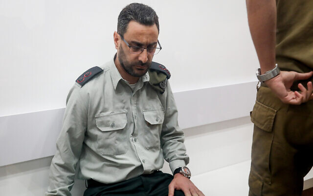 Lt. Col. Dan Sharoni, an IDF officer accused of sexual offenses, arrives for a court hearing at a military court in Beit Lid, July 24, 2022. (Flash90)