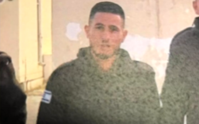 Shehadeh Abu Alqian, 25, who is charged with spying for a Gaza-based terror group, is seen wearing an Israeli military uniform in May 2022. (Courtesy)