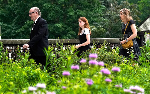 Mourners arrive for the funeral service for Stephen Straus, who was killed Monday in a mass shooting at the Fourth of July parade in Highland Park, Ill., at the Jewish Reconstructionist Congregation, July 8, 2022, in Evanston, Ill. (AP Photo/Charles Rex Arbogast)
