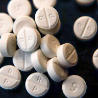 Illustrative: 5-mg pills of Oxycodone, June 17, 2019. (AP Photo/Keith Srakocic, File)