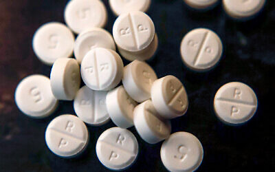 Illustrative: 5-mg pills of Oxycodone, June 17, 2019. (AP Photo/Keith Srakocic, File)