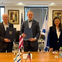 L-R: Public Security Minister Omer Barlev, US Embassy Deputy Chief of Mission Jonathan Shrier, and Interior Minister Ayelet Shaked at the signing of the Preventing and Combating Serious Crime information-sharing agreement, July 7, 2022 (US Embassy in Israel)