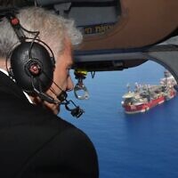 Prime Minister Yair Lapid flies over the Karish gas field on July 19, 2022. (Amos Ben Gershom/GPO)