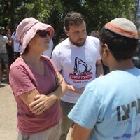 An activist from the Nachala Settlement Movement organization confronts a Peace Now activist at a rally point for Peace Now, which is sending volunteers into the West Bank to stymie Nachala's effort to establish three new settlement outposts. (Courtesy Peace Now)
