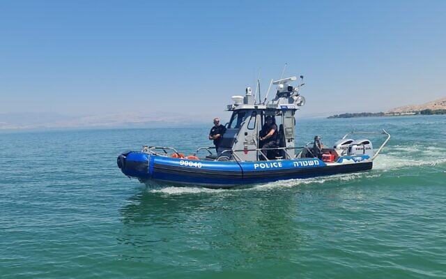 A police boat conducts searches in the Sea of Galilee, July 24, 2022. (Israel Police)