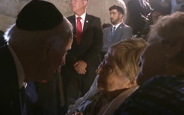 US President Joe Biden speaks with Holocaust survivors Rena Quint and Giselle (Gita) Cycowicz at Yad Vashem in Jerusalem on July 13, 2022. (Screenshot)