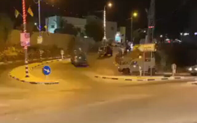 Israeli military vehicles are seen in the West Bank town of Qarawat Bani Hassan, July 25, 2022. (Screenshot: Twitter)
