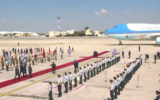 President Isaac Herzog approaches Air Force One, as US President Joe Biden lands in Israel, July 13, 2022. (Screen grab)