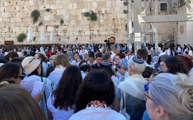 Women read from a Torah at the Western Wall on July 20, 2022. (Noga Tarnopolsky via JTA)
