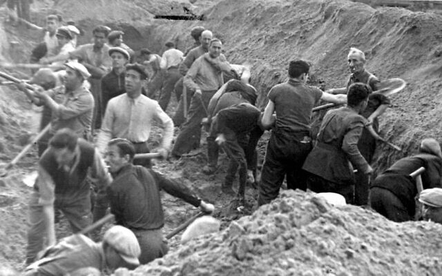Ponary, Lithuania, Jews digging a trench in which they were later buried after being shot (Yad Vashem)