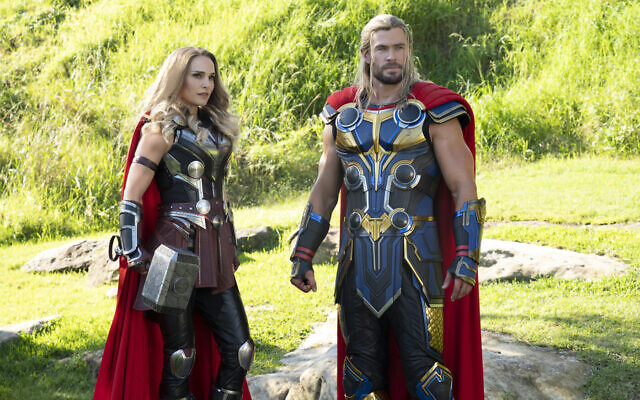 Natalie Portman and Chris Hemsworth in ‘Thor: Love and Thunder.’ (Courtesy Walt Disney Studios Motion Pictures)