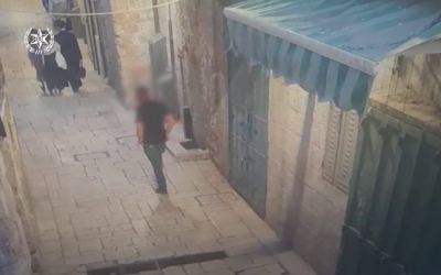 A Palestinian man accused of planning a stabbing attack is seen in Jerusalem's Old City, July 22, 2022. (Israel Police)