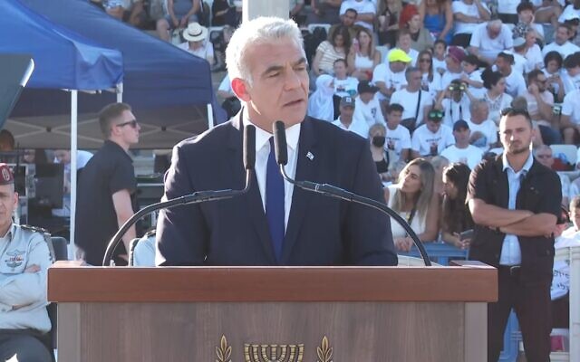 Prime Minister Yair Lapid speaks at an IDF officers graduation ceremony on July 7, 2022. (Screen capture/YouTube)