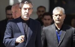 Iran's chief nuclear negotiator Ali Bagheri Kani (L) leaves after talks at the Coburg Palais, the venue of the Joint Comprehensive Plan of Action (JCPOA) in Vienna on August 4, 2022. (Alex HALADA / AFP)