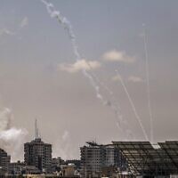Rockets are fired from Gaza City on August 6, 2022, in the aftermath of Israeli aerial bombardment. (Mahmud Hams/AFP)