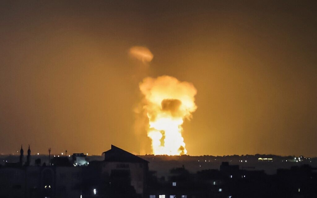 A fireball rises from the site of an Israeli airstrike in Khan Yunis in the southern Gaza Strip on August 7, 2022 shortly before a ceasefire took effect. (MOHAMMED ABED/AFP)