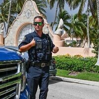 Local law enforcement officers are seen in front of the home of former president Donald Trump at Mar-A-Lago in Palm Beach, Florida, August 9, 2022. (Giorgio Viera/AFP)