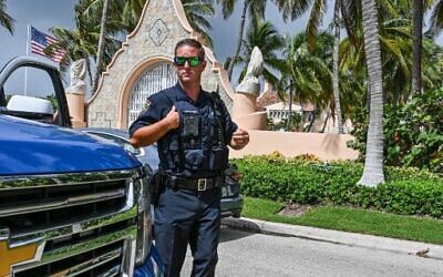 Local law enforcement officers are seen in front of the home of former president Donald Trump at Mar-A-Lago in Palm Beach, Florida, August 9, 2022. (Giorgio Viera/AFP)