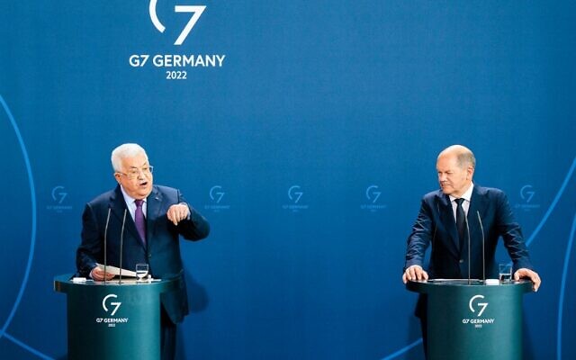 German Chancellor Olaf Scholz (R) and Palestinian Authroity President Mahmud Abbas hold a joint press conference at the Chancellery in Berlin, Germany, on August 16, 2022. (Jens Schlueter/AFP)
