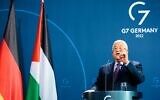 Palestinian Authority President Mahmoud Abbas holds a joint press conference with German Chancellor Olaf Scholz at the Chancellery in Berlin, Germany, on August 16, 2022. (JENS SCHLUETER / AFP)