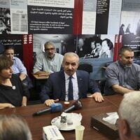 Palestinian Authority Prime Minister Mohammad Shtayyeh speaks at the Palestinian Al-Haq Foundation in the West Bank city of Ramallah after Israel raided and closed an entrance to their offices, on August 18, 2022 (ABBAS MOMANI / AFP)