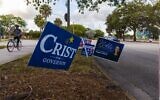 A political campaign sign for Charlie Christ and Nikki Fried, who are both running for the Governors seat, outside of a polling station on August 23, 2022 in West Palm Beach, Florida. (Saul Martinez/Getty Images/AFP)
