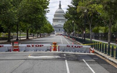 The area where a man crashed into a barricade at the US Capitol on August 14, 2022 in Washington, DC. A man crashed his car into a barricade protecting the US Capitol early Sunday and fired a handgun in the air several times before fatally shooting himself. (TASOS KATOPODIS / GETTY IMAGES NORTH AMERICA / via AFP)
