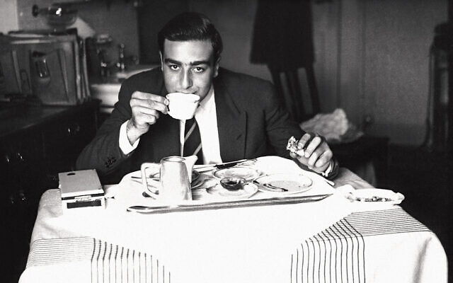 Edmond J. Safra, at age 16, eating breakfast in Geneva in 1948. As a teenager in the late 1940s, he lived out of hotels and conducted business for his father in Europe. (Edmond J. Safra Foundation)